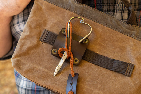 Carrying a Daggerfish MItten Scissor holster on a FIeld Bag