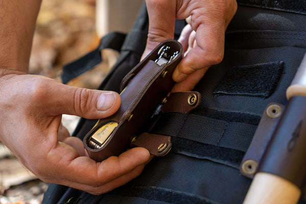 Attaching a Daggerfish Universal Knife Sheath to a tactical backpack using a MOLLE Strap Adapter