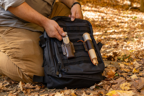 Daggerfish knife sheath and handline attached to a MOLLE backpack